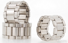 Repurposed stainless steel watch band rings, in a variety of styles and sizes
