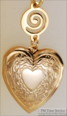 Gold-toned heart shaped locket with floral engraving & round connector with a swirl design