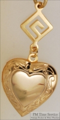 Gold-toned heart shaped locket with delicate engraving & Greek key geometric pattern connector