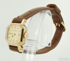 Caravelle by Bulova 17J ladies' wrist watch, YBM & SS case, gold-toned pattern finish dial