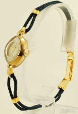 Helbros 21J ladies' wrist watch #21600, attractive smooth polish YBM & SS slender oval-shaped case