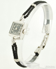 Timex 0J ladies' wrist watch, elegant WBM & SS rectangular case, fancy chevron style extended lugs