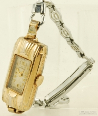 Harman 17J ladies' wrist watch in a YGF & SS long rectangular case
