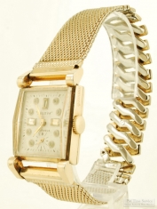 Bulova 17J wrist watch, heavy smooth polish YGF rectangular case with a slender bezel