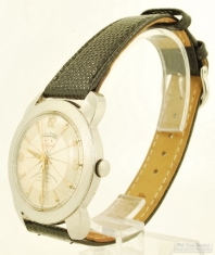 Hilton 25J automatic wrist watch, SS water resistant case, silver-white metal dial w/ wheel design