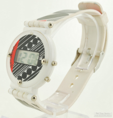 Jordache quartz digital wrist watch with day & date, white plastic & SS round case, matching band