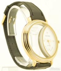 Suizo quartz wrist watch, oversized YBM round skeletonized case, crystal hour markers on dial