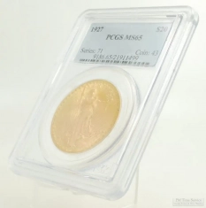 1927 Saint-Gaudens $20 gold coin, grade MS65, sealed in a PCGS protective sleeve