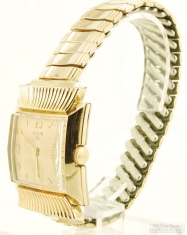 Elgin 17J adj. grade 673 wrist watch, distinctive YGF & SS square case with flared fan design, boxed