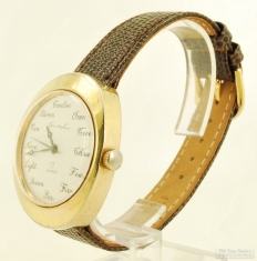Kenneth Jay Lane 17J wrist watch, heavy YBM & SS oval water-resistant case, script dial numbers