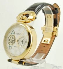 Stührling 20J automatic wrist watch, gold-flashed SS pocket-watch shaped WR case, skeletonized dial