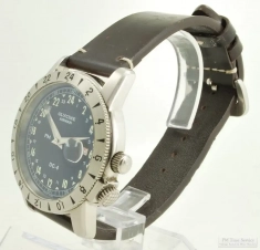 Glycine 25J automatic Airman DC-4 Purist 24-hour wrist watch w/ quickset date, WR SS case, wood box