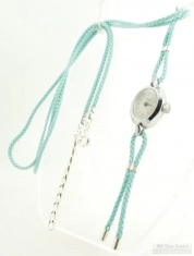 Vintage repurposed Timex ladies' wrist watch with a mint green watch band cord necklace