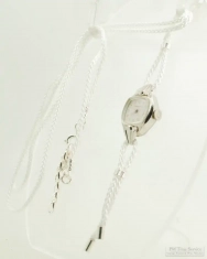 Vintage repurposed Caravelle by Bulova ladies' wrist watch with a white watch band cord necklace