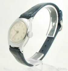 Timex 0J ladies' wrist watch, heavy WBM & SS chrome cushion-shaped case, new rubber navy blue band