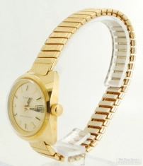 Timex 1J with date ladies' wrist watch, heavy cushion-shaped YBM & SS smooth polish case