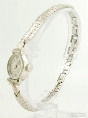Bulova 23J grade 5BD N3 ladies' wrist watch, lovely oval WGF smooth polish case, diamond-set lugs