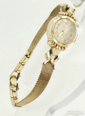 Elgin 17J adj. grade 662 ladies' wrist watch #P933102, elegant YGF & SS case w/ elongated heart lugs