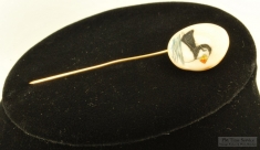 Hand-painted porcelain vintage lapel pin with a puffin design, gold-plated pin stopper