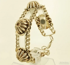 Vintage 9" coin silver double-strand curb link bracelet with decorative medallions