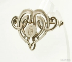 Sterling silver Celtic heart-shaped lapel pin with hook, round monogram shield, early 1900s, 2.3dwt