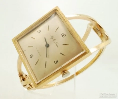 Style Time 21J grade 1601 wrist watch, large square YBM case, open YBM cuff-style bracelet band