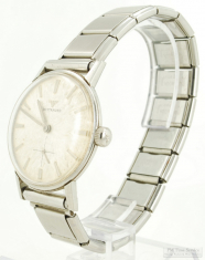Wittnauer 15J wrist watch, classic WBM & SS round thin model WR case with a narrow tapered bezel
