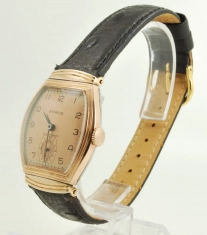 Benrus 17J model BB4 wrist watch, case #270133, elegant RGF & SS tonneau-shaped thin-model case