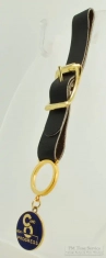 Base metal and enamel C & O fob with a black leather pocket watch fob strap