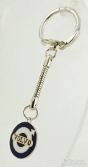 Base metal and enamel Volvo shield fob with a matching latch-style key chain